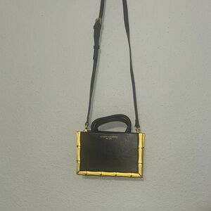 Elegant Black and Gold Handbag